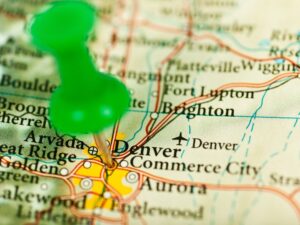 A pin on a map pointing to Denver, CO.